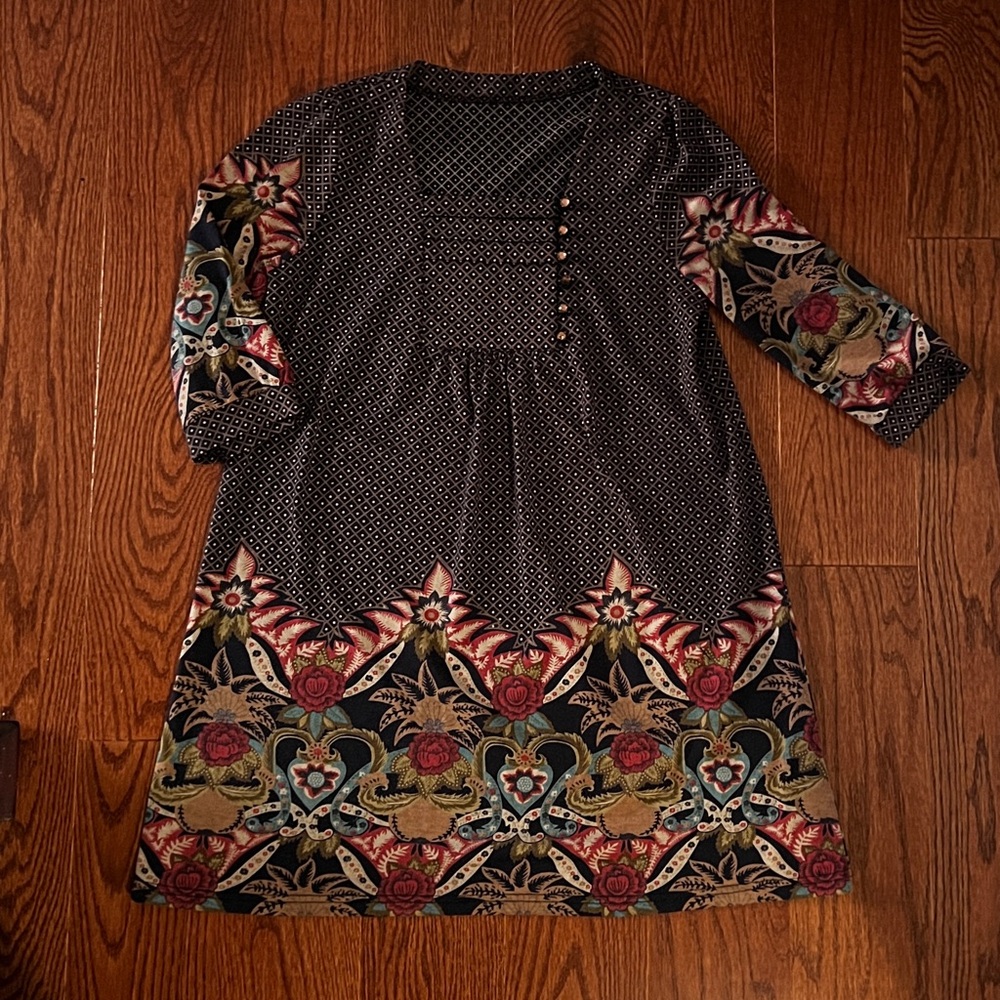 Navy cotton poly blend dress with eastern print detail.